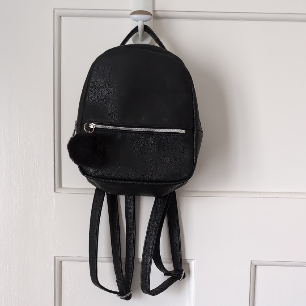 Black H&M Mini Backpack with Pom Pom Accent
